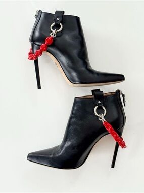 DSquared2 Black Leather Pointed Stiletto Ankle Booties with Red Chain Accent